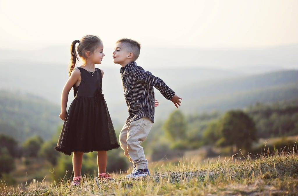 Young Children in Relationship_boy trying to kiss the girl